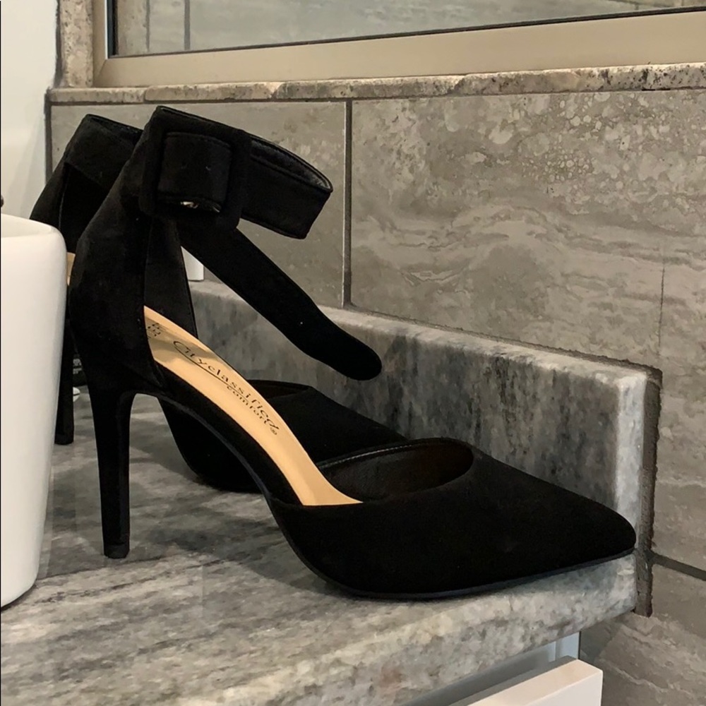 New, never work, black heels with ankle strap.